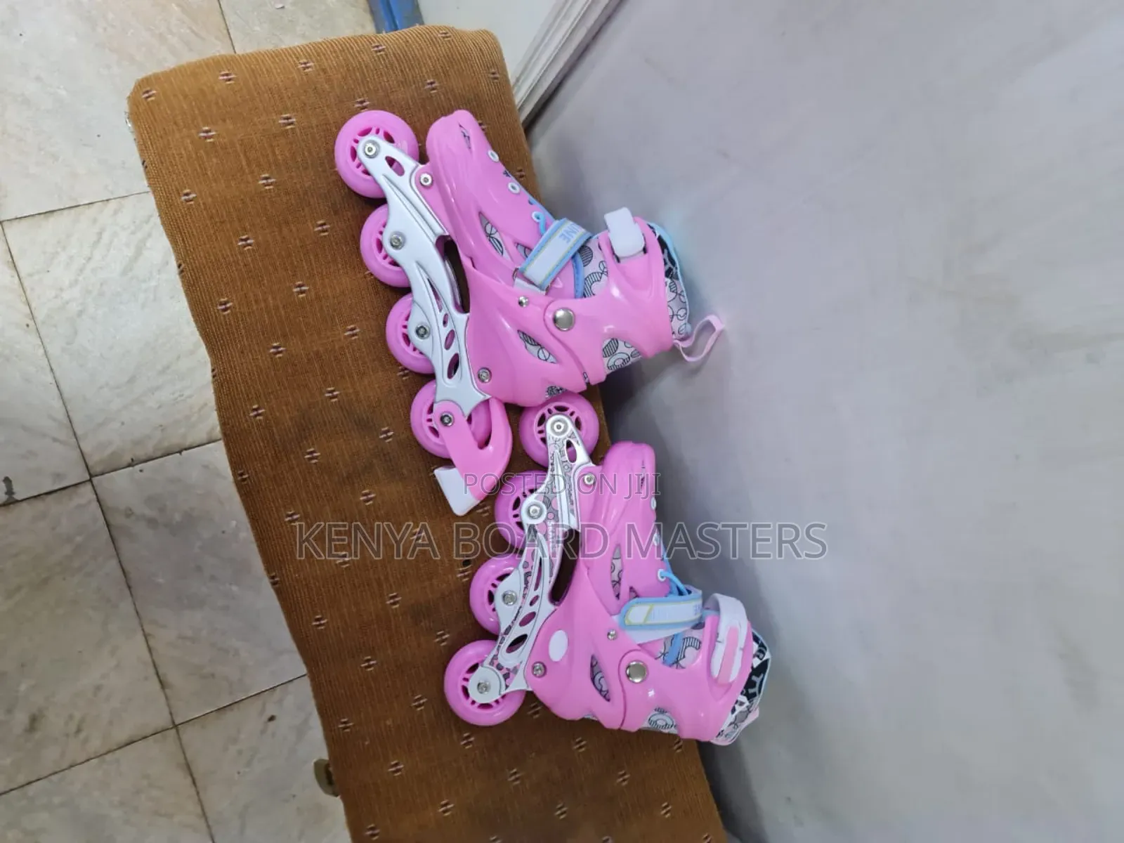 Pinkish Hard Skate Shoes. Rubber Wheeled Skate Shoes
