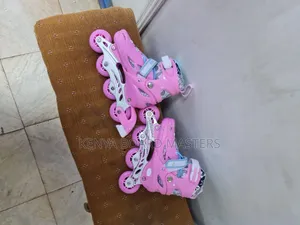 Pinkish Hard Skate Shoes. Rubber Wheeled Skate Shoes