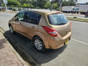 Nissan Tiida 2011 Gold