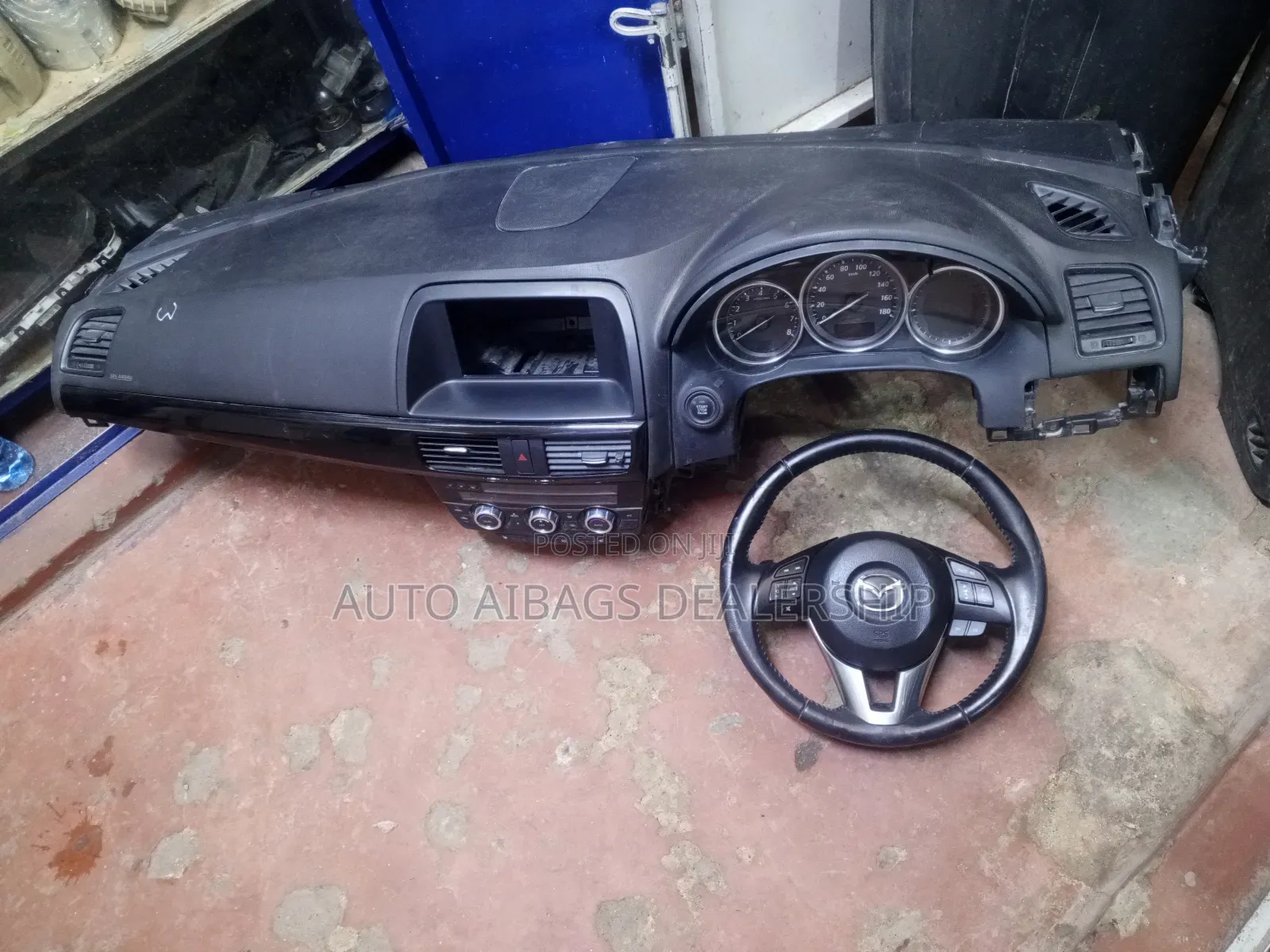 Mazda CX-5 Dashboard and Stearing but Without a/C Clock.