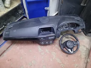 Mazda CX-5 Dashboard and Stearing but Without a/C Clock.