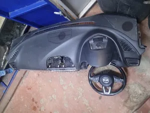 Mazda Axela Dashboard and It's Stearing.