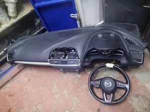 Mazda Axela Dashboard and It's Stearing.