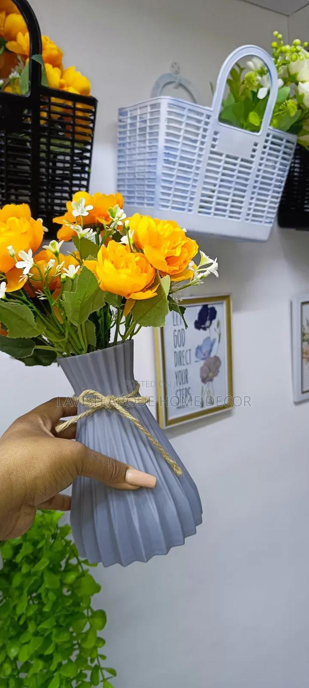 Grey Flower Vase With Orange Flowers