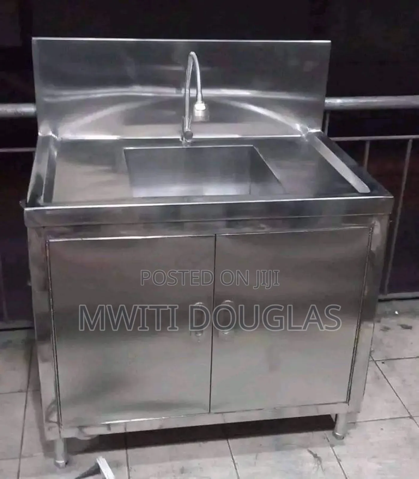 Stainless Steel Sink With a Tap