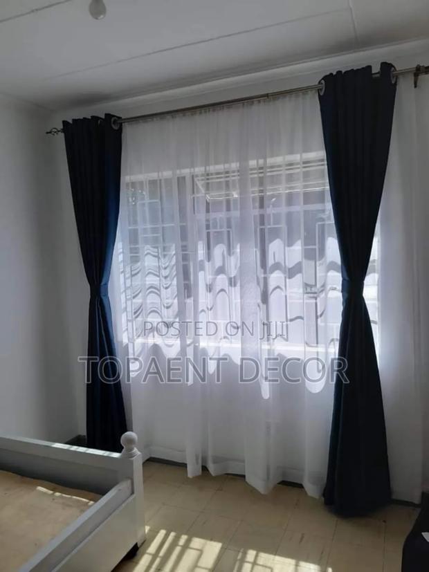 Dark Blue Window Curtain and White Sheers