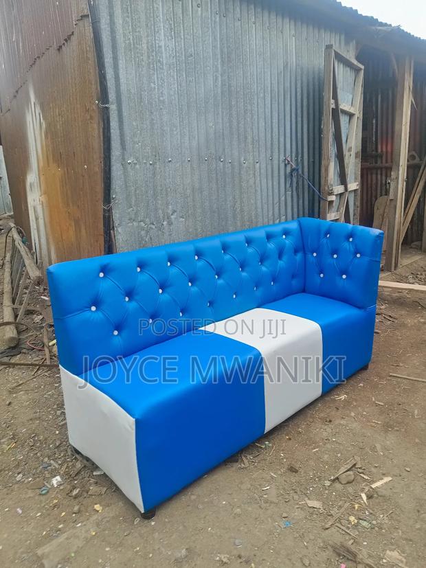 Couch Blue and White, With Armrest on Left Side. - main view