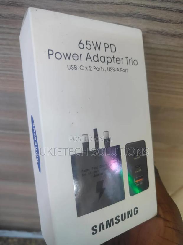 Charger.65 Watts .For All Electronic Devices.Trio Adapter - main view