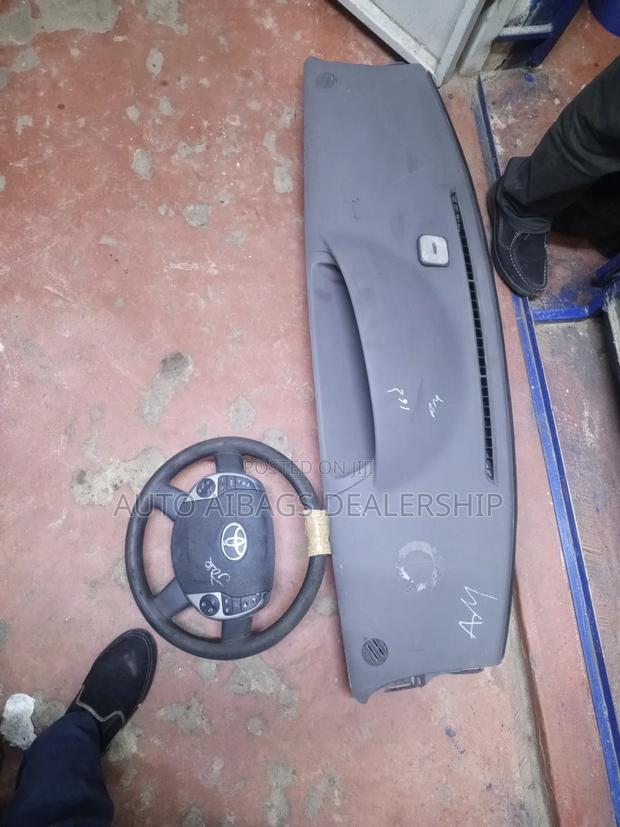 Toyota Raum Dashboard and Stearing.