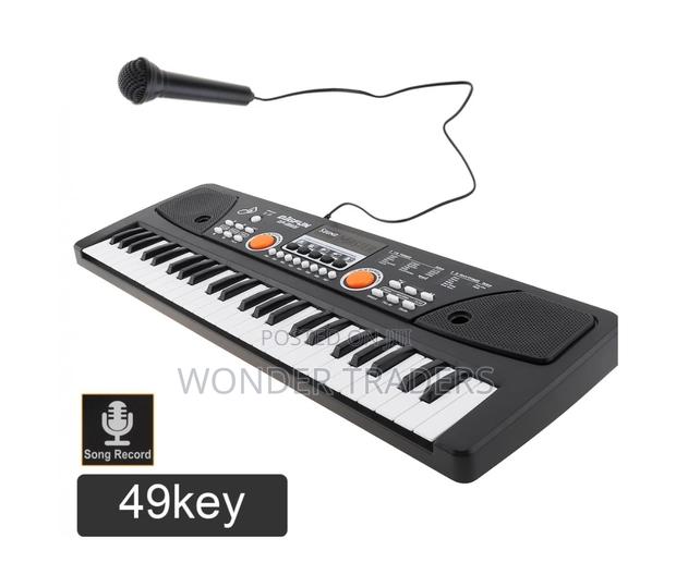 49keys Piano+ Microphone + USB Slot 16 Tones , 8 Rhythm