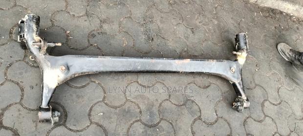 Toyota NZE Rear Beam Mlingoti Axle