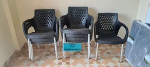 Black Complast Plastic Chairs With Metal Tubing Legs