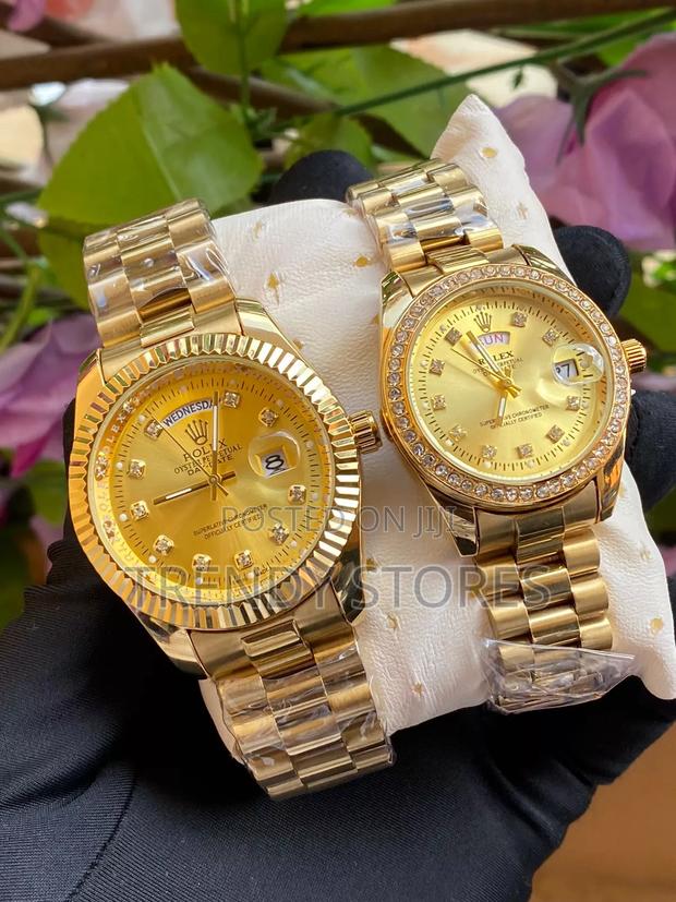 Gold Rolex Couple's Watch Set