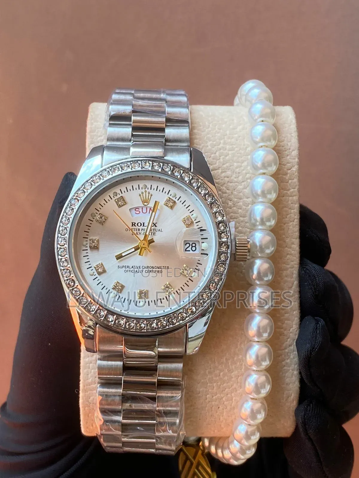 Silver Rolex Watch With Pearl Bracelet