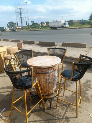 High Bar Set of Chairs and a Barrel Table 