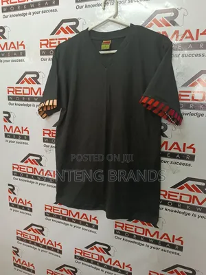 V Neck Branded With Kitenge Decorations.