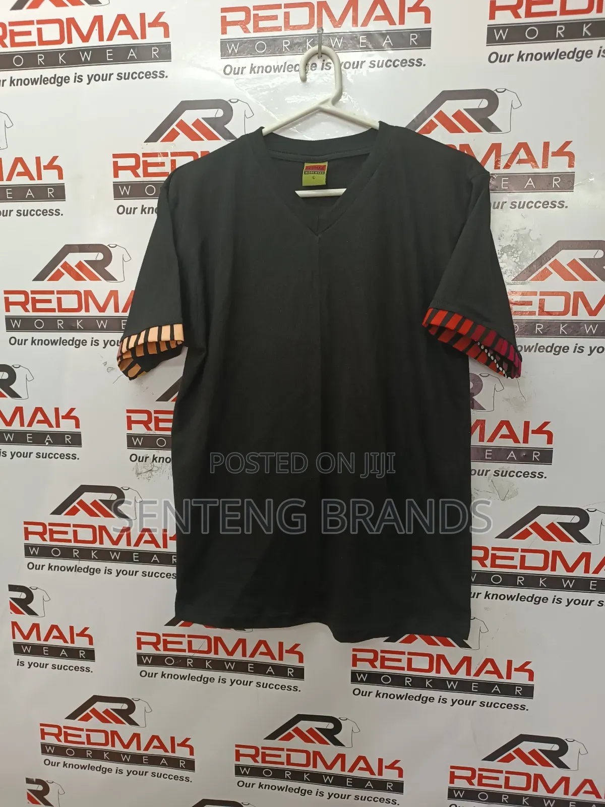 V Neck Branded With Kitenge Decorations.