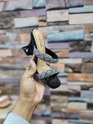 Designer Opens Shoes