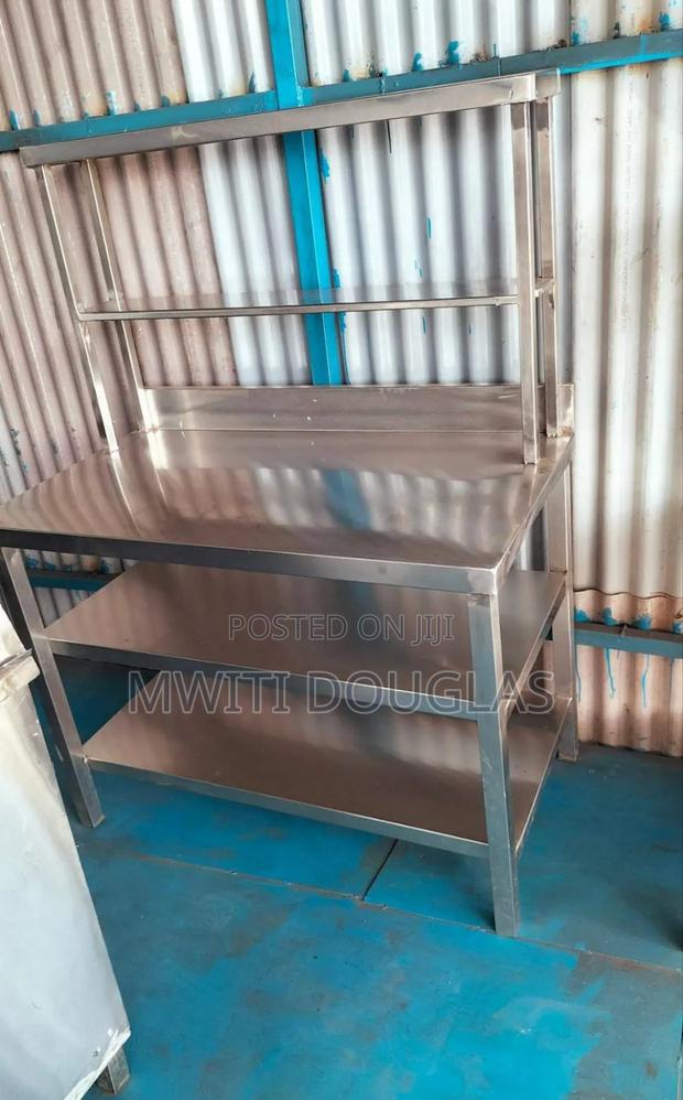 Double Shelves Working Table With a Rack