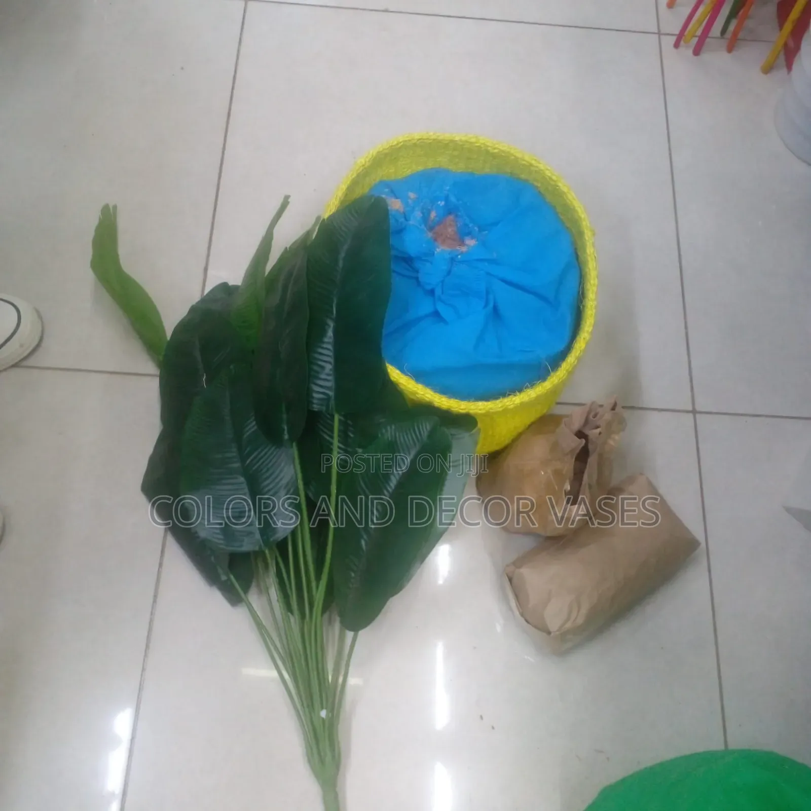 Basket, Banana Artificial Plant and Stones