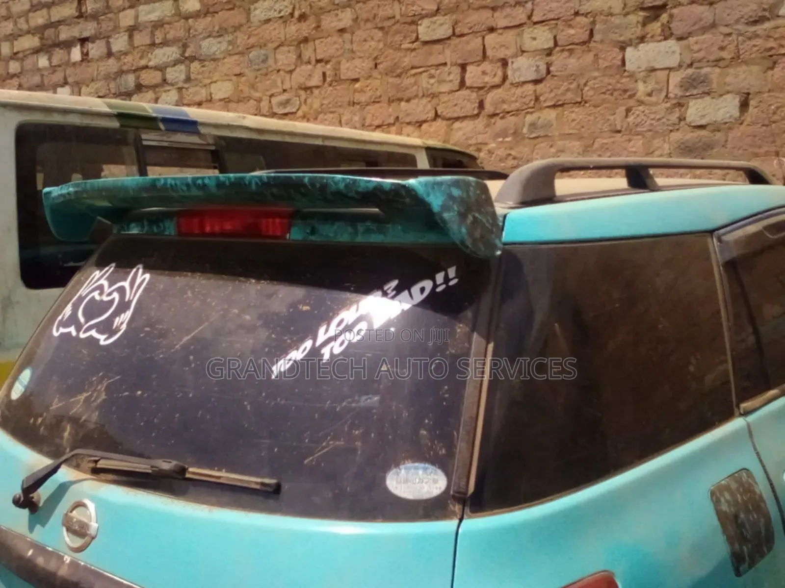 Nissan Wingroad Ad/Mazda Familia Spoiler