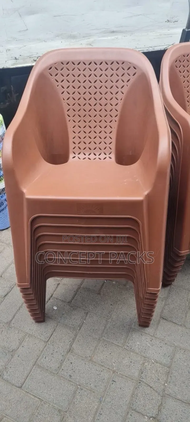 Brown Plastic Easy Chair.