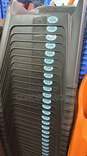 Brown Plastic Easy Chair.