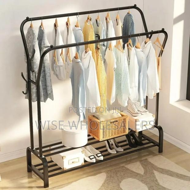 *Curved Double Clothes Rack With 2 Bottom Shelf Storage