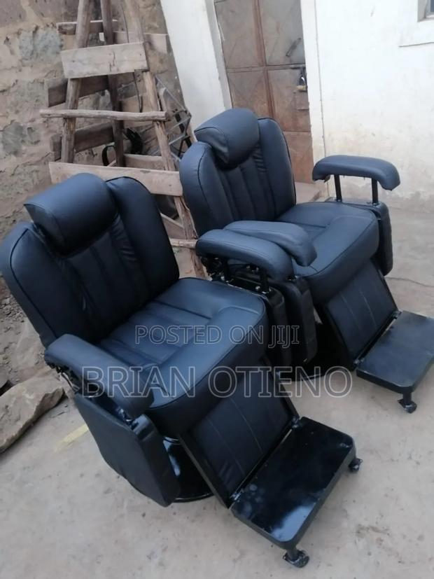 Kinyozi Seats With Black Leather - main view