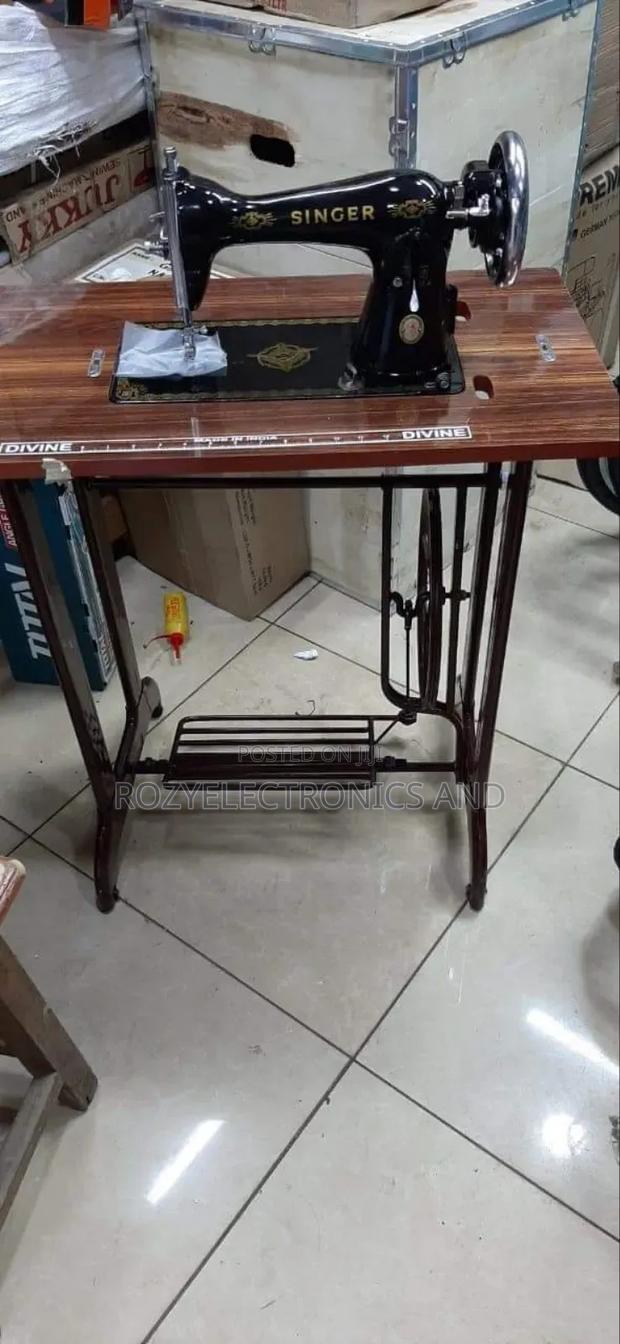 Singer Sewing Machine and Imported Table - main view