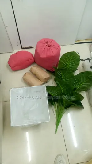 A Set of Artificial Plant, Plastic Vase and White Stones