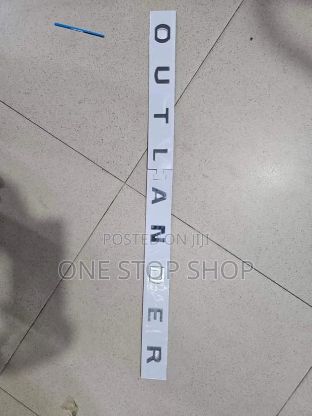 OUTLANDER Lettering Badge