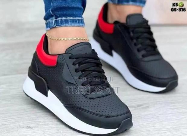 **Tommy Hilfiger Sneakers**LADIES EDITION* *Ksh 2000*
