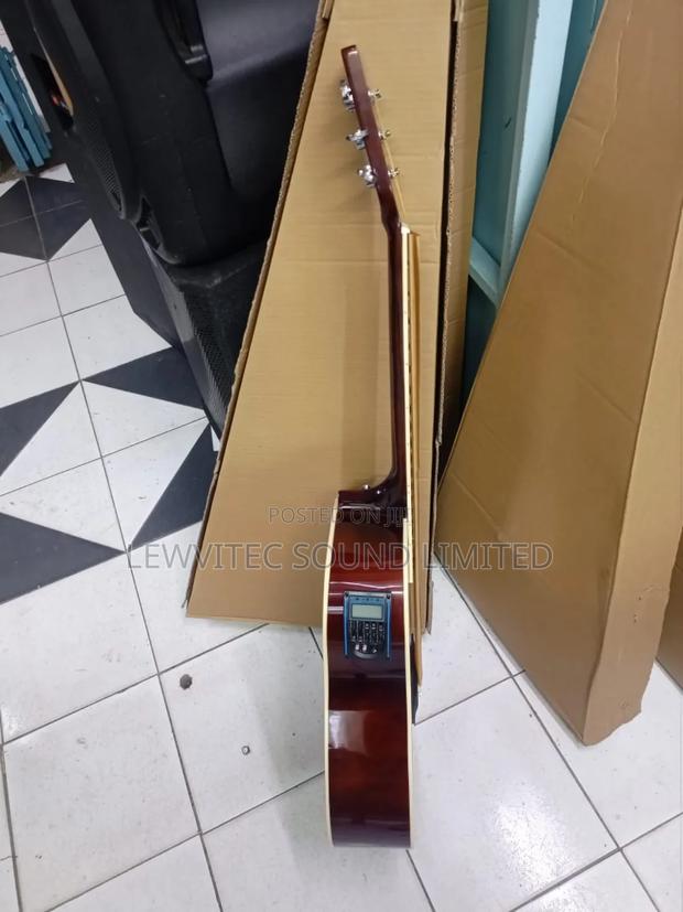Brown Fender Guitar - main view