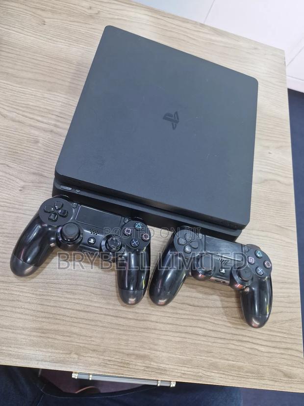 Play Station 4 Slim With 2 Controllers - main view
