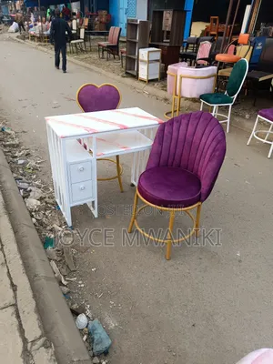 Manicure Set, Marble Table and 2 Purple Seats.