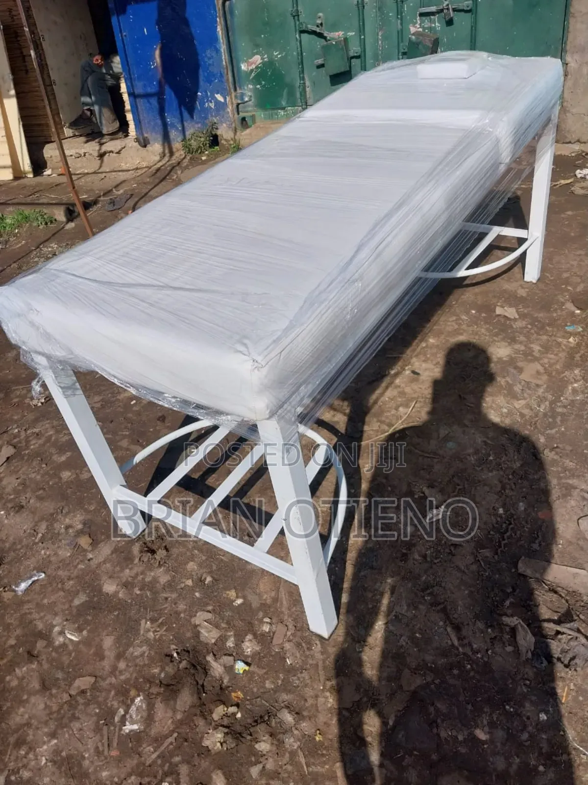 White C Stands Massage Bed