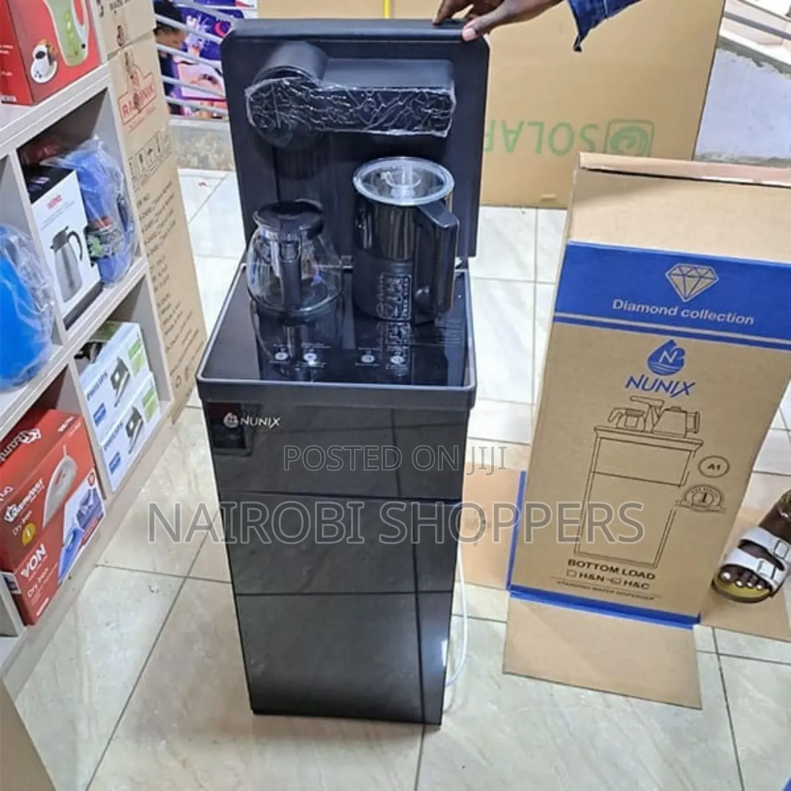 Bottom Load Dispenser Nunix With a Kettle Coffee Maker
