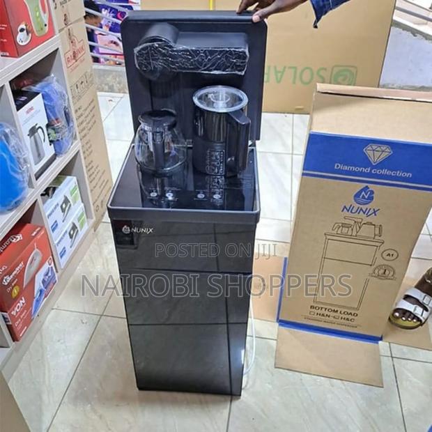 Bottom Load Dispenser Nunix With a Kettle Coffee Maker