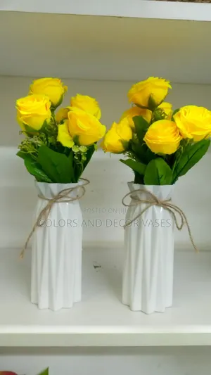 Yellow Flowers With Plastic Vase