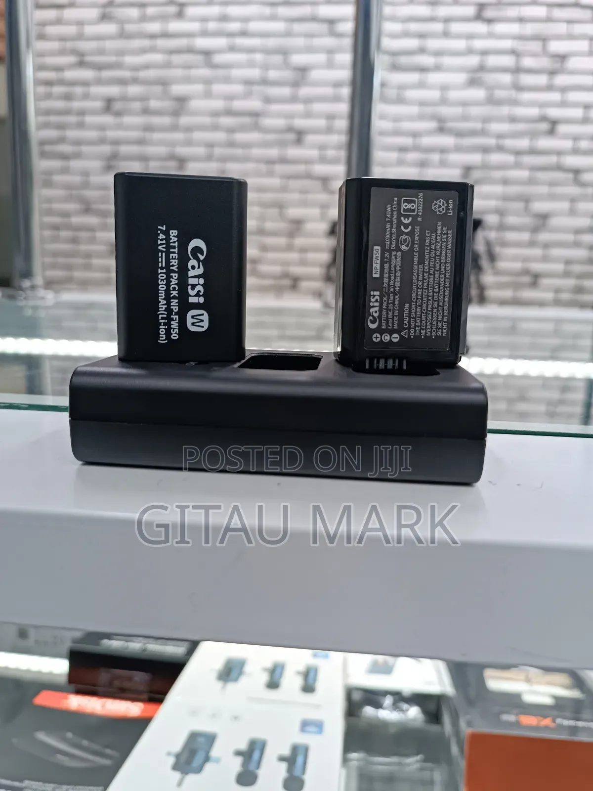 Caisi Np Fw50 Dual Batteries and a Charger