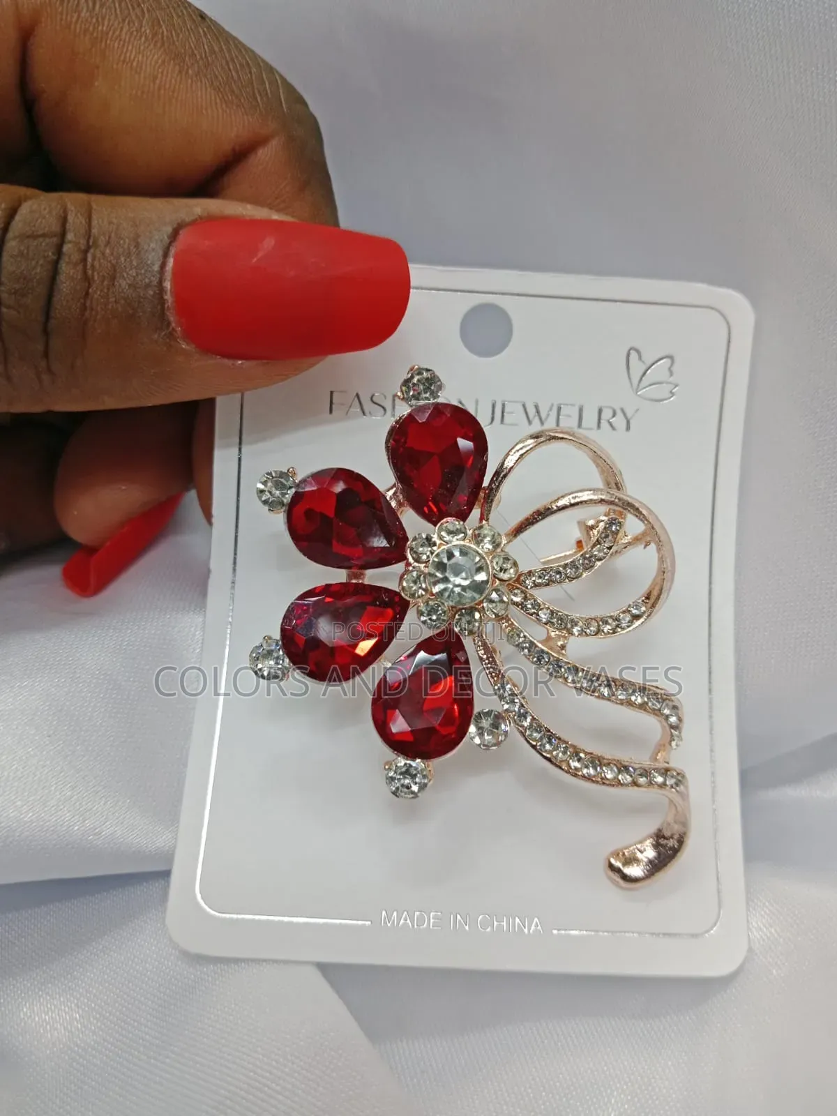 Red Brooches Available