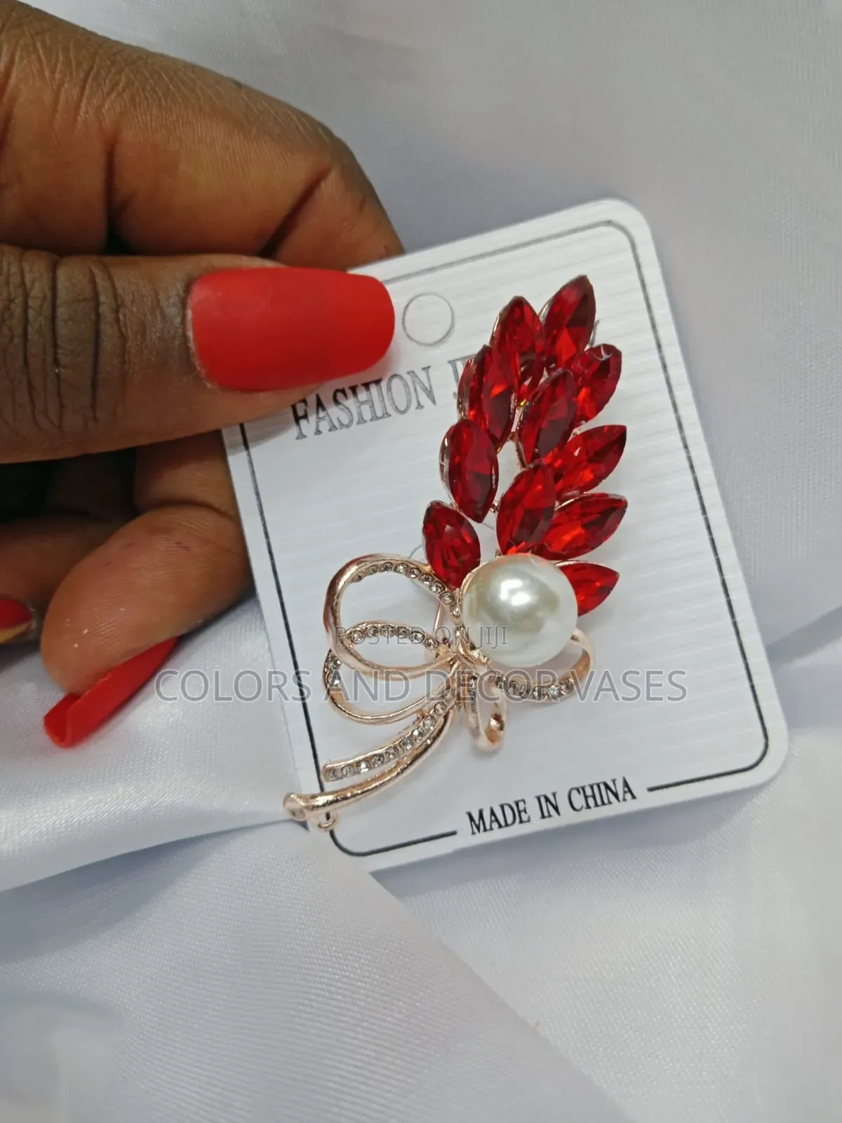 Red Brooches Available