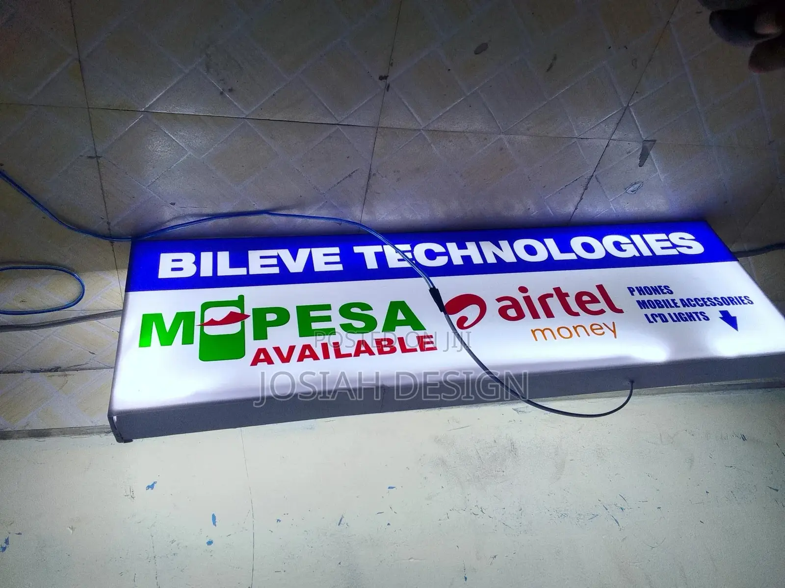 Mpesa Signage | Light Box Banner Mounting