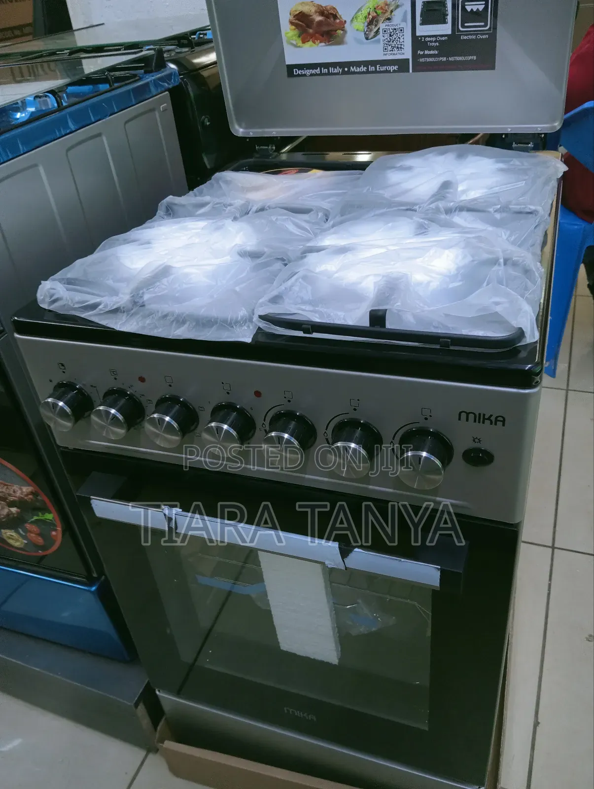 Mika 50 by 60 3 Gas and 1 Electric Cooker