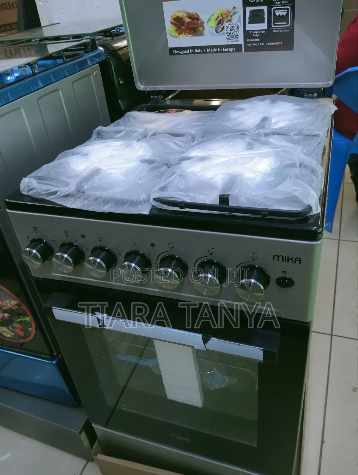 Mika 50 by 60 3 Gas and 1 Electric Cooker