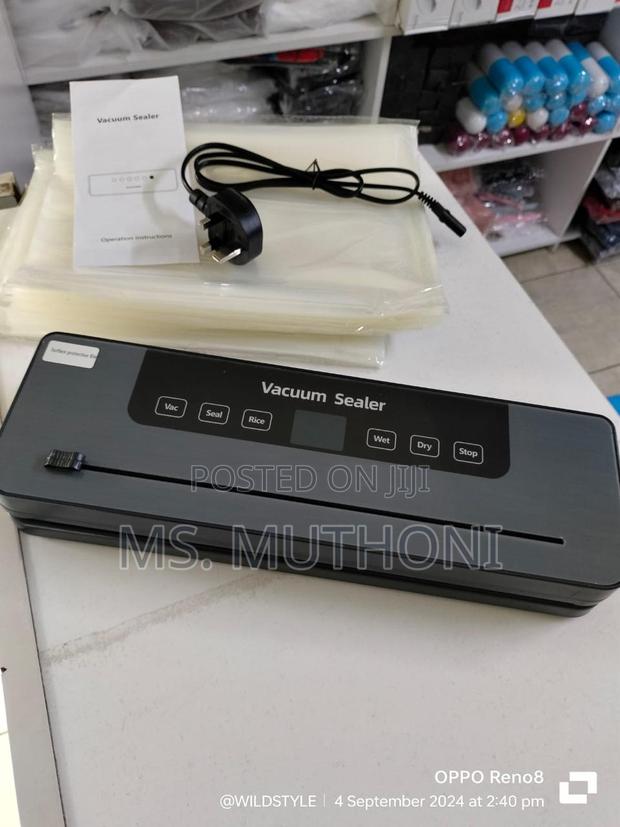 Electric Vacuum Sealer Machine With 10pcs Packaging Papers - thumbnail 6