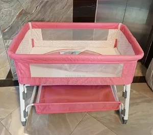 Baby Co-Sleeper With Adjustable Height.