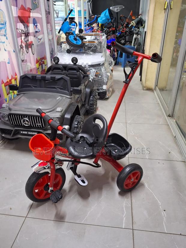 Tricycle With Push Handle