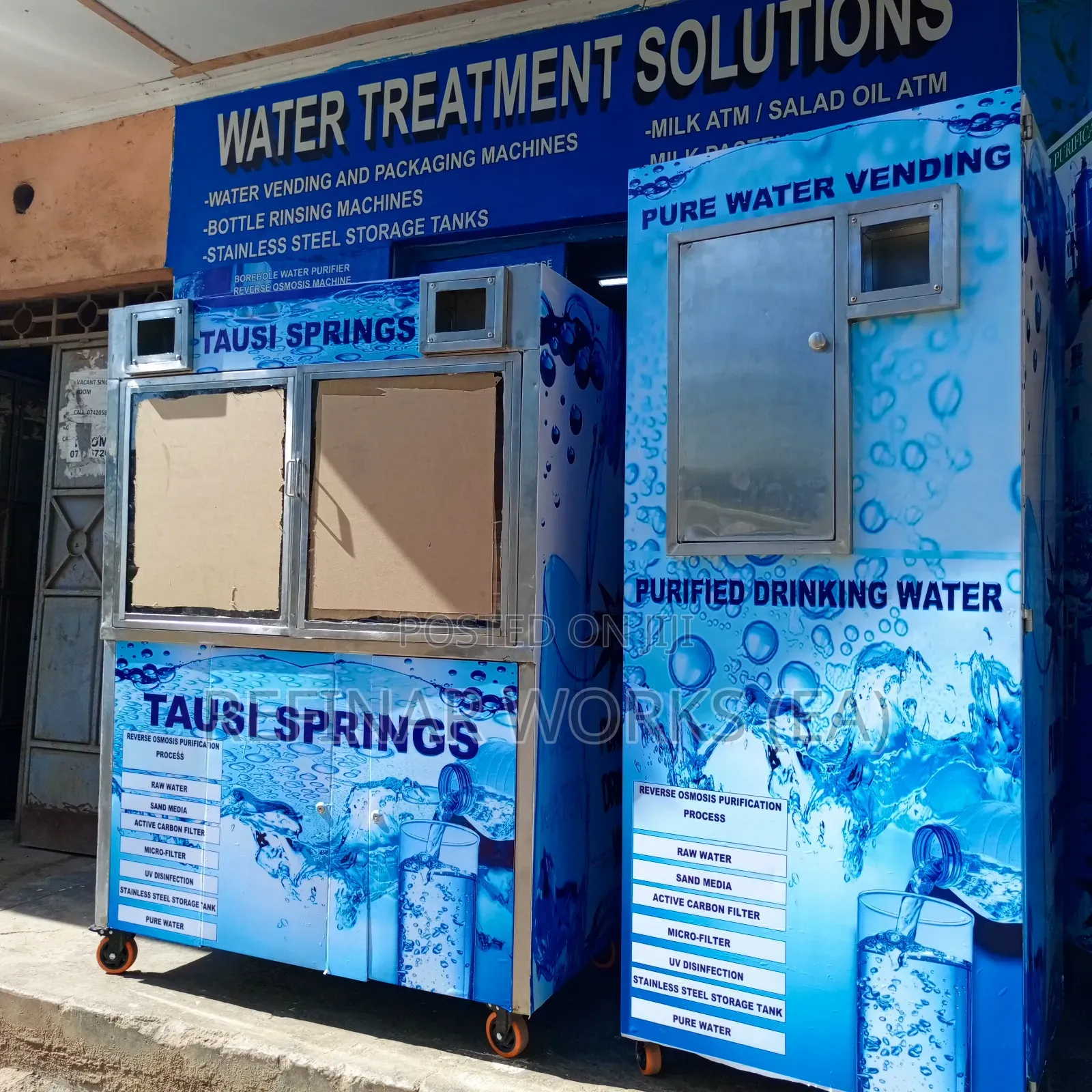 Water Vending Cabinet. Simple Wall Mounted. Accepts Coins.